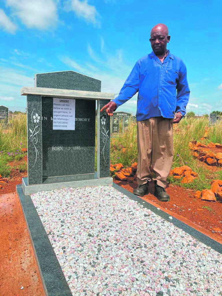 Mkhulu Mishack Mahlangu wants the other family to remove their tombstone from the grave of his late wife, Martha Mbonani.     Photo by Bulelwa Ginindza