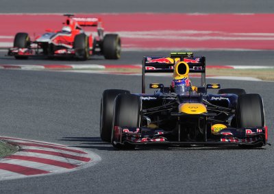 <b>TESTING TIMES:</b> Red Bull and Ferrari cars in pre-season testing at the Catalunya circuit near Barcelona, Spain, on February 23, 2012. <i>Image: AFP</i>