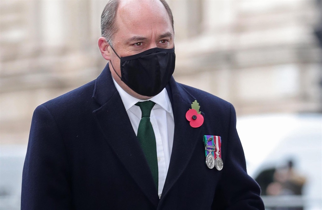 Britains Defence Secretary Ben Wallace, wearing a protective face covering to combat the spread of the coronavirus, arrives to attend a service to mark the centenary of the burial of the unknown warrior at Westminster Abbey in central London.