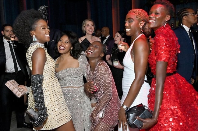 Thuso Mbedu with Dominique Fishback, Sheila Atim, Lashana Lynch, and Ann Akinjirin at the 2022 Vanity Fair Oscar Party. 