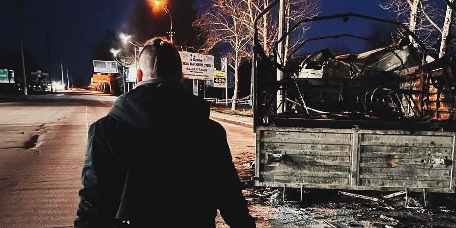 20-year-old Igor walks through the streets of Russian-occupied Kherson, Ukraine.