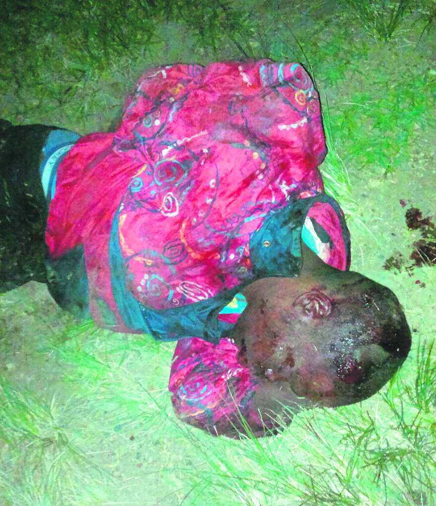 A man lies bleeding after angry residents beat him in Nsimbini.  