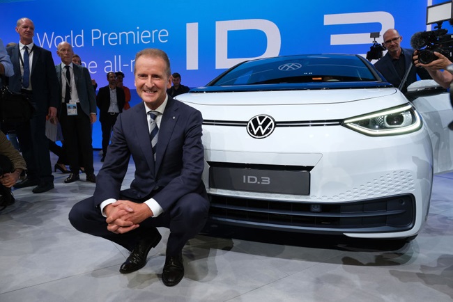Herbert Diess, Chairman of Volkswagen Group, poses with the new Volkswagen ID.3 electric car at the Volkswagen media preview at the 2019 IAA Frankfurt Auto Show on September 09, 2019 in Frankfurt am Main, Germany. 