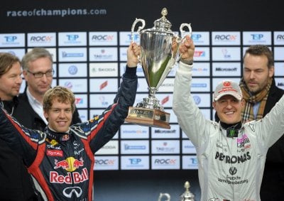 <b>THE OLD AND THE NEW:</b> Sebastian Vettel and Michael Schumacher celebrate Germany's win in the 2011 Race of Champions held in December, 2011. 