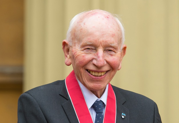 <b> MOTORSPORT LEGEND: </b> This file photo taken on March 15, 2016 shows motor racing legend John Surtees posing with his Commander of the Order of the British Empire (CBE). <i> Image: AFP / Dominic Lipinski </i>
