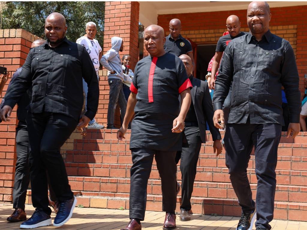 Floyd Shivambu and Julius Malema outside court