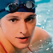 Transgender swimmer’s “doctored” images spark controversy