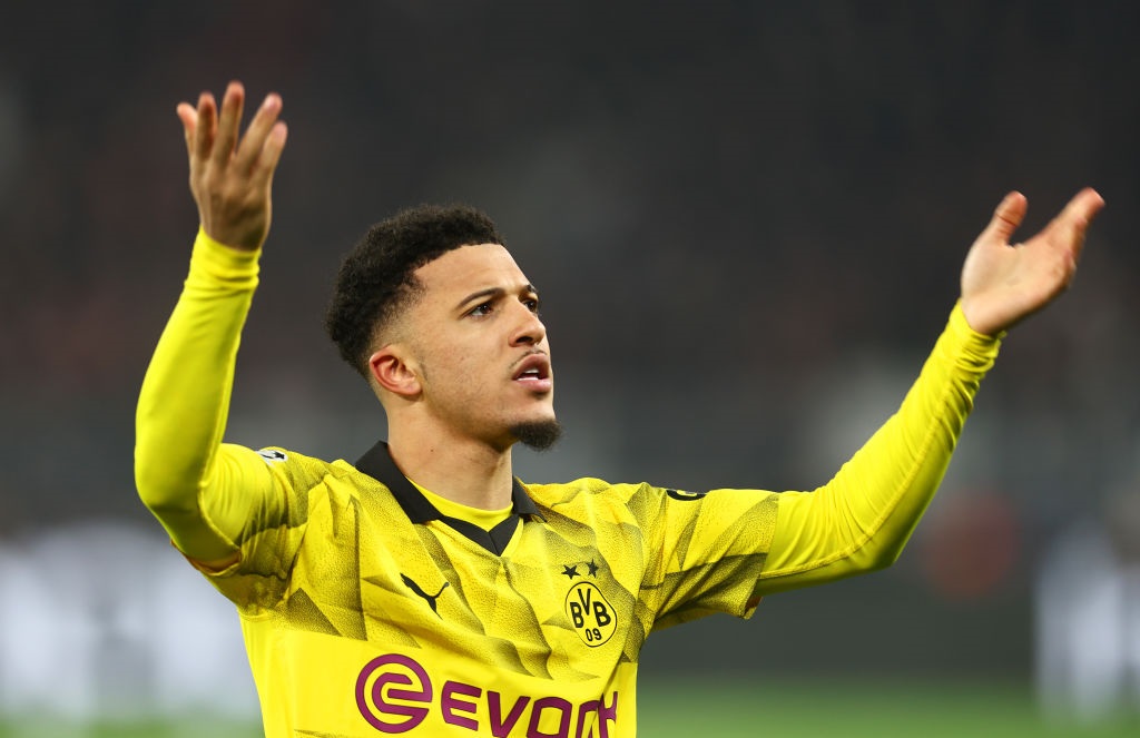 DORTMUND, GERMANY - MARCH 13: Jadon Sancho of Borussia Dortmund celebrates scoring his teams first goal during the UEFA Champions League 2023/24 round of 16 second leg match between Borussia Dortmund and PSV Eindhoven at Signal Iduna Park on March 13, 2024 in Dortmund, Germany. (Photo by Leon Kuegeler/Getty Images)