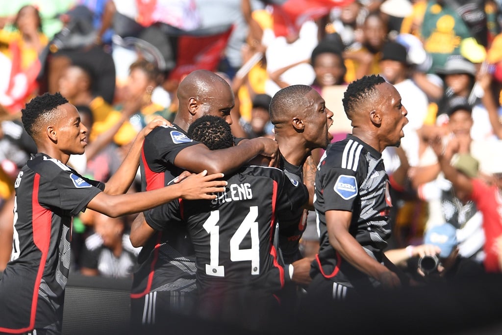:Monnapule Saleng of Orlando Pirates celebrates his goal with teammates during the DStv Premiership match between Orlando Pirates and Kaizer Chiefs at FNB Stadium on March 09, 2024 in Johannesburg, South Africa. 