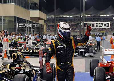 <b>KIMI CUTS IT AT LAST:</b> Lotus F1's Kimi Raikkonen celebrates in the parc ferme at the Yas Marina circuit in Abu Dhabi after winning the 2012 Abu Dhabi F1 GP, his first win since returning to F1 in 2012. <i>Image: AFP</i>