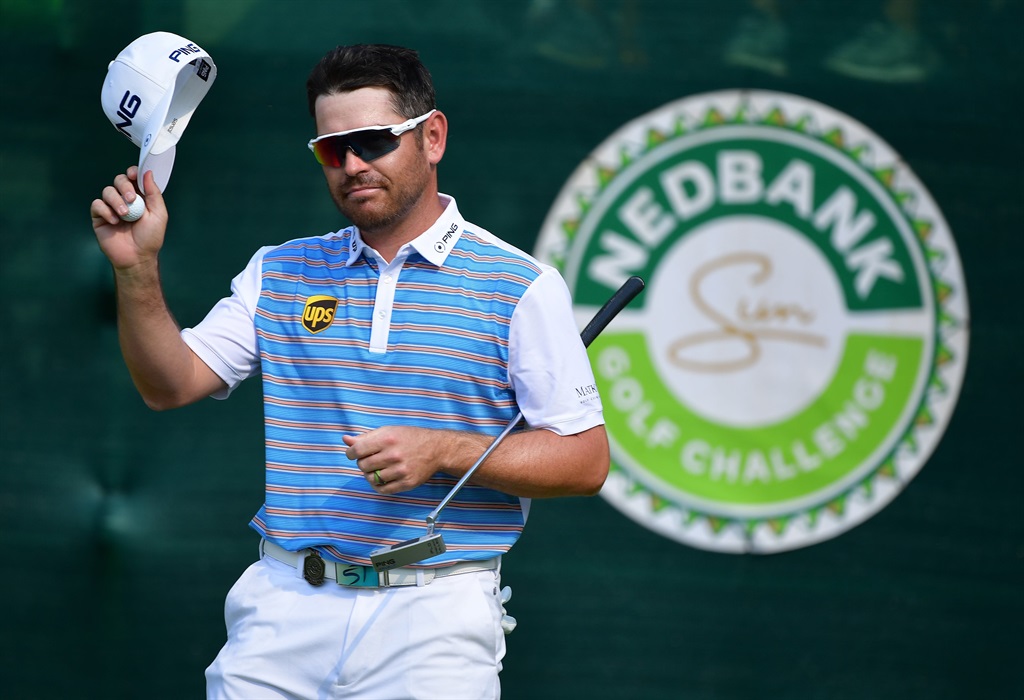 Top CONTENDER South African golfer Louis Oosthuizen waves his cap during the third round of the Nedbank Golf Challenge at the Gary Player Country Club on Saturday. Oosthuizen managed to keep leader Sergio Garcia within sight going into Sunday’s final roundPHOTO: Stuart Franklin / Getty Images