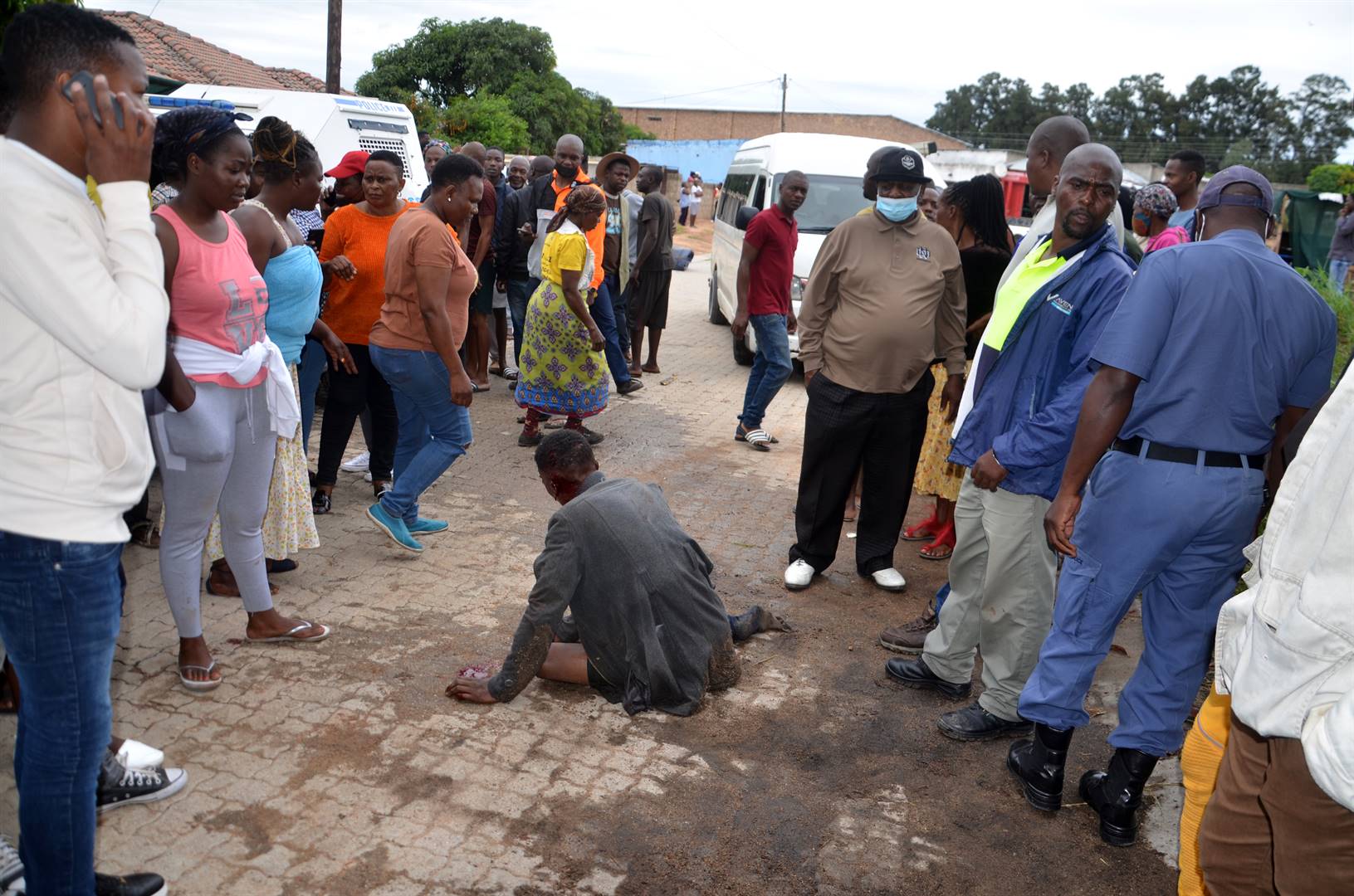 A nyaope gangster was moered by angry residents before being rescued by the police.    Photo by Oris Mnisi 