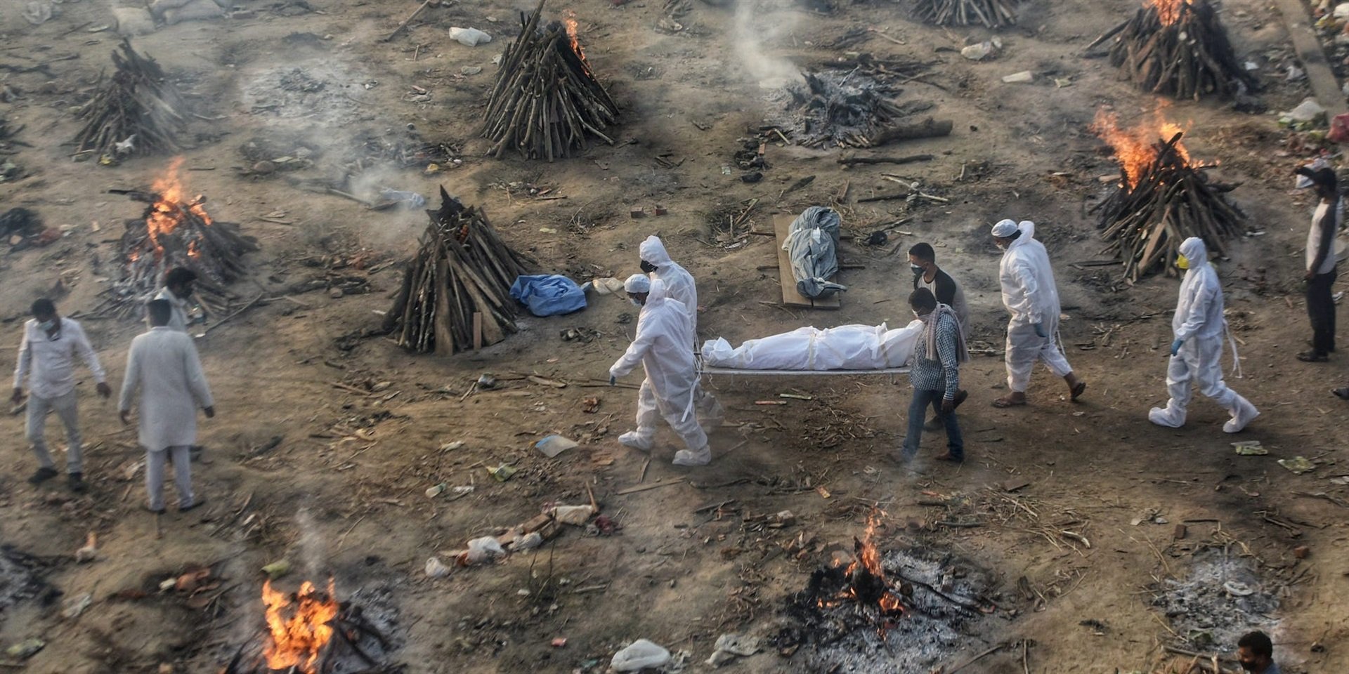 Covid-19 victims being cremated at Seemapuri crematorium in New Delhi, India. 