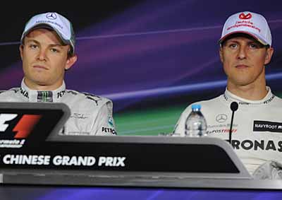 <b>MERCEDES TRIUMPH:</b> Nico Rosberg (left) and Michael Schumacher will fill grid Row 1 for the 2012 Chinese F1 GP - which one is twice the age of the other? <i>Image: AFP</i>