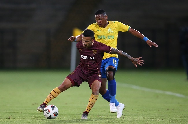 Junior Leandro Mendieta attempts to keep possession away from Andile Jali. (Photo by Shaun Roy/BackPagePix/Gallo Images)