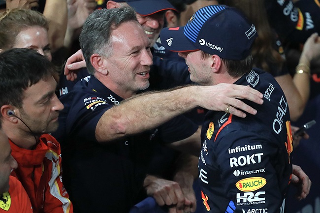 Max Verstappen and Christian Horner celebrate after the F1 Grand Prix of Saudi Arabia at Jeddah Corniche Circuit on 9 March 2024. (Photo by Qian Jun/MB Media/Getty Images)