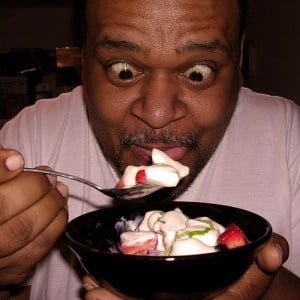 Fat guy eating fruit salad - Google Free Images