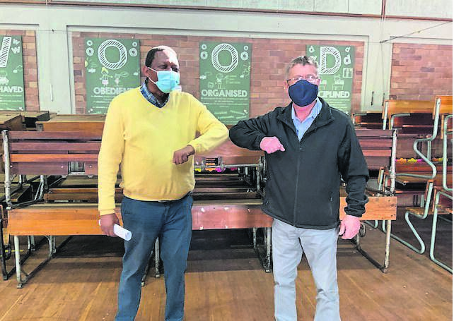 From left are, Andile Maneli, headmaster of Emfundweni Primary School and Gary Pike, headmaster of Greenwood Primary School.      Photos: SUPPLIED
