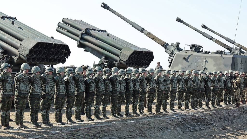 This picture shows troops during a joint forces artillery training exercise at an undisclosed location in North Korea. (KCNA via KNS/AFP)