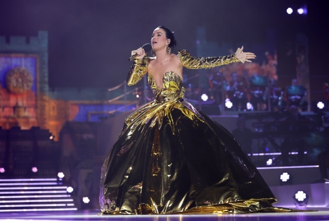 The pop star wowed in a dramatic Vivienne Westwood gown as she took to the stage at the coronation concert in Windsor to perform her hits Roar and Firework. (PHOTO: Gallo Images/Getty Images)