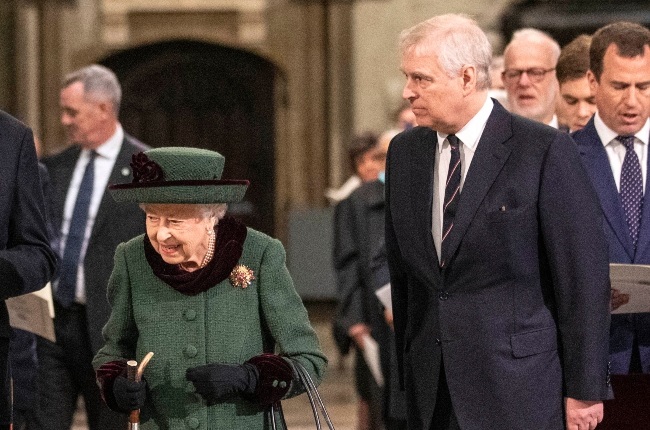 Prince Andrew escorts the queen inside Westminster Abbey for Prince Philip's memorial service on 29 March. (PHOTO: Gallo  Images/Getty Images)