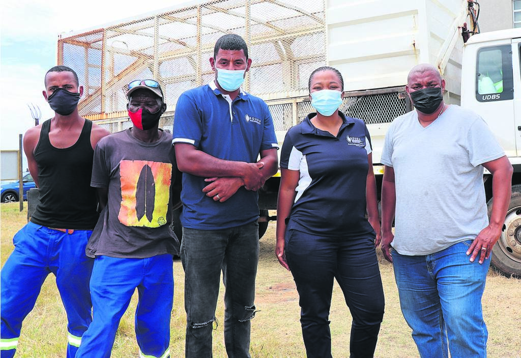 Tyron Swarts, Welcome Mqadi, Abduraghiem Adams (driver), Nomvelo Siwela (environmental specialist), and Thembelani Hesha (Gamtoos Valley superintendent) are ready to take to the streets from January 17 to January 28 to help residents get rid of unwanted items and goods.                    Photo: SUPPLIED