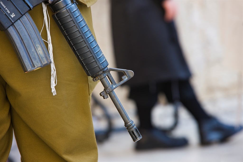 An Israeli soldier's rifle at the Western Wall.