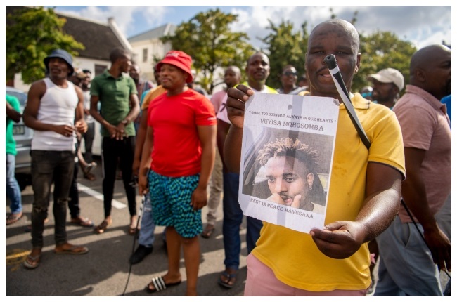 E-hailing drivers protesting outside the Stellenbosch magistrate's court where five suspects appeared for the murder of a fellow driver.