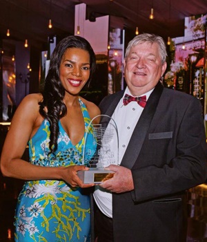 Connie Ferguson with Whitey Basson, the CEO of Shoprite
PHOTO: Marthinus Retief 
