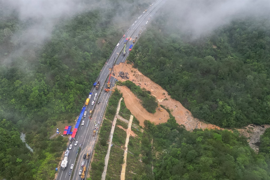 This photo taken on 1 May 2024 shows an aerial view of a collapsed section of a highway near Meizhou in southern China's Guangdong province. At least 36 people died after part of a highway collapsed due to heavy rain on 1 May, state media said. (CNS/AFP)