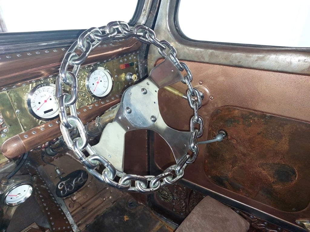 Rat rod chain steering wheel and inlaid brass dash