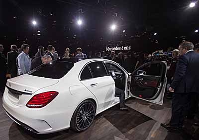 <b>NEXT C-CLASS LAUNCHED IN DETROIT:</b> Journalists and car enthusiasts gather to feast their eyes on the new Mercedes-Benz C-Class and other exciting models at the 2014 Detroit auto show.<i> Image: AFP</i> 