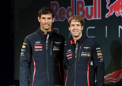 <b>FAKE SMILES?</b> 2012 F1 champion Sebastian Vettel (right) claims he is not the favourite for 2013 and that team mate Mark Webber is one of the biggest threats. <i>Image: AFP</i>