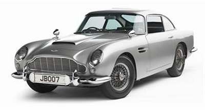 The 1965 Aston Martin DB5 as used in, and for the promotion of, the <i>Goldfinger</i> and <i>Thunderball</i> James Bond movies. Small machine guns protrude from the grille.