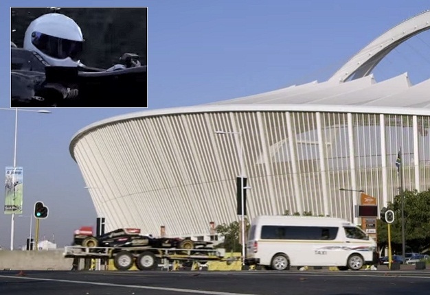 <b>THE STIG ON HOLIDAY IN DURBAN:</b> The Stig gets a ride to the Moses Madiba stadium courtesy of a friendly taxi driver in Durban. <i>Image: YouTube, Top Gear </i>