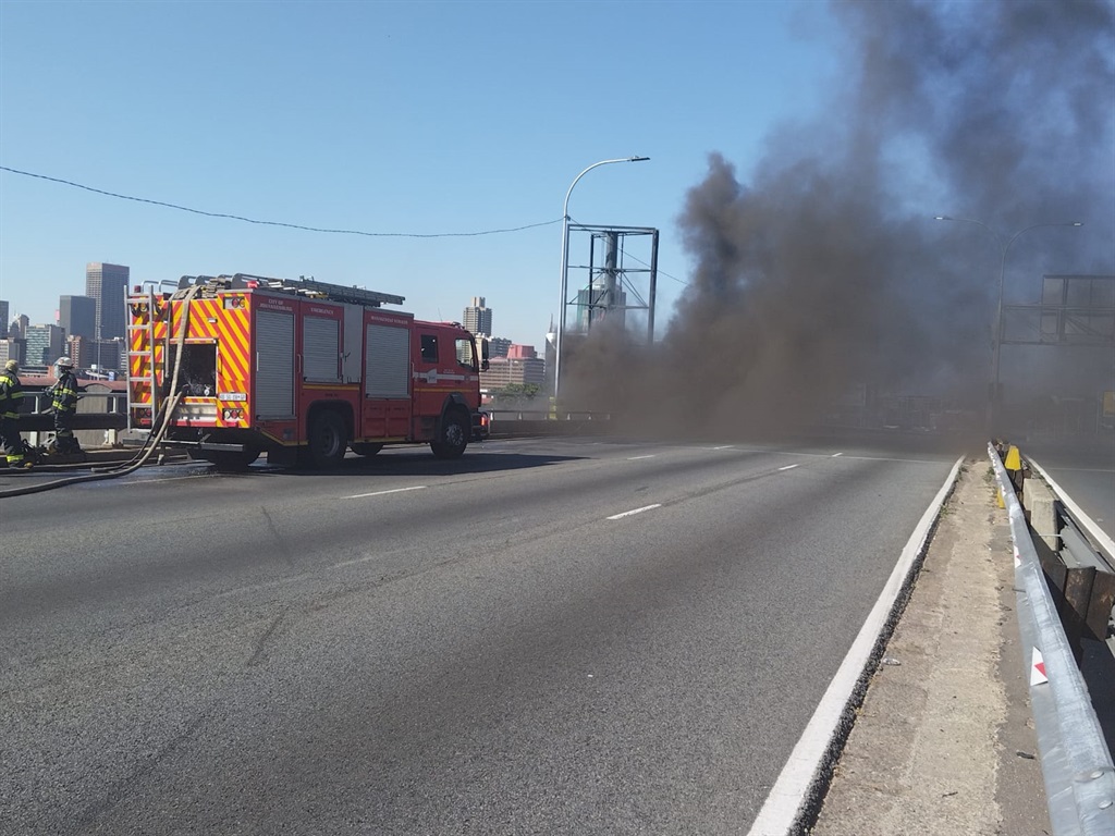 Smoke engulfed the M1 highway in Braamfontein, Joburg.