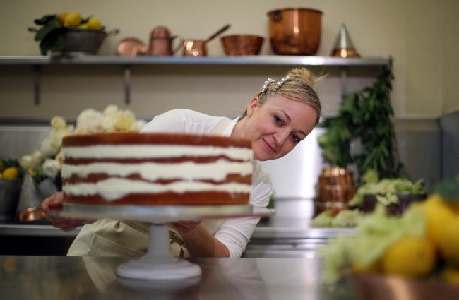 Claire Ptak in the process of making Meghan Markle's wedding cake at Buckingham Palace.