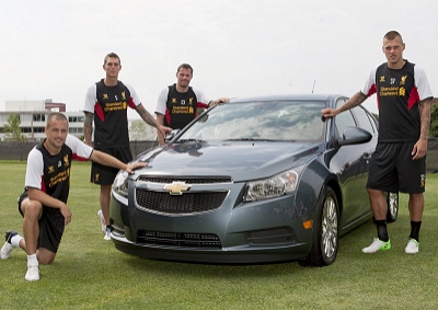 <b>CHEV RIDES WITH THE REDS:</b> Liverpool players (From left) Joe Cole, Daniel Agger, Jamie Carragher and Martin Skrtel pose with a Cheverolet Cruze following the US automakers announcement as the team's official automotive sponsor.