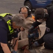 WATCH | Police use drill to free superglued activist in Berlin
