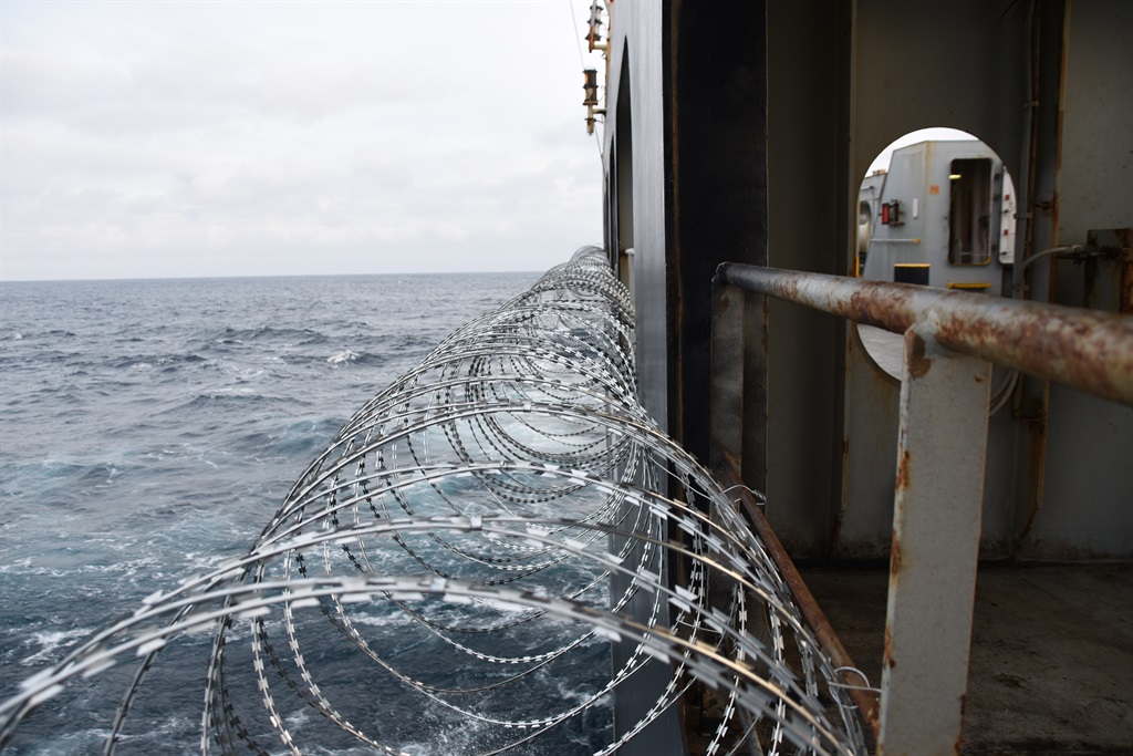 Barbed wire attached to the ship hull, superstructure and railings to protect the crew against piracy attack in the Gulf of Guinea in West Africa. (File)