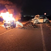 Man dies as car bursts into flames during head-on collision