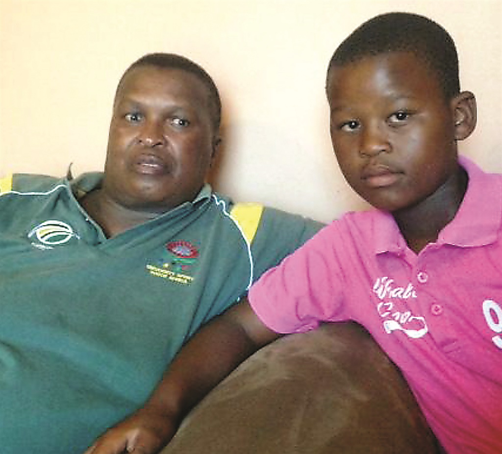 Nozizwe Mapoma (63) and her grandson Inganathi (11) at home in Walmer Township, Port Elizabeth. Picture: Lubabalo Ngcukana 