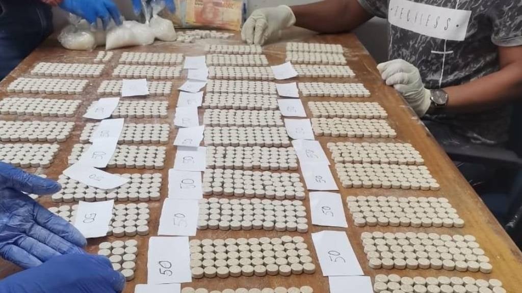 Police confiscated 2 450 mandrax tablets with an estimated street value of R180 000, and 8 bags of tik valued at R45 000.