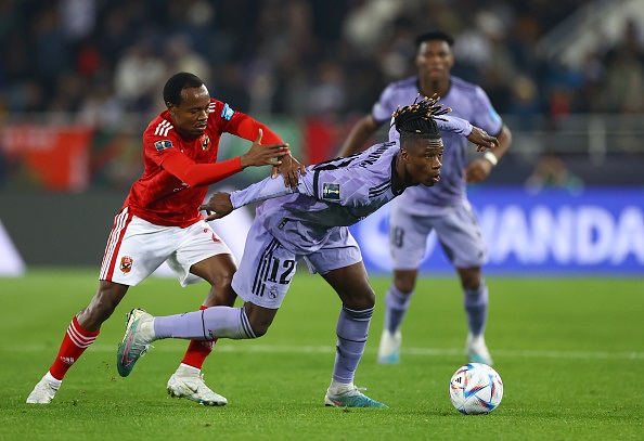 Eduardo Camavinga of Real Madrid is challenged by Percy Tau of Al Ahly FC during the FIFA Club World Cup Morocco 2022 Semi Final match between Al Ahly and Real Madrid CF at Prince Moulay Abdellah on February 08, 2023 in Rabat, Morocco. (Photo by Michael Steele/Getty Images)