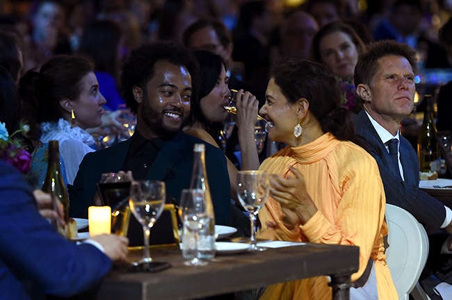 Bobby Wooten III and Katie Holmes attend The Moth 