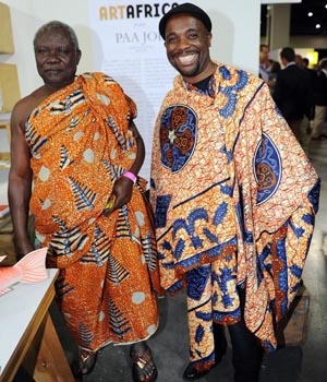 Ghanaian sculptor of world famous fantasy coffins Paa Joe (left) with South African photographer and adman Victor Dlamini. Picture: Lucky Nxumalo