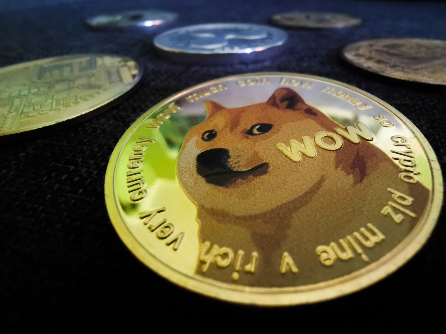 dogecoin surges as tesla begins accepting the crypto for ...