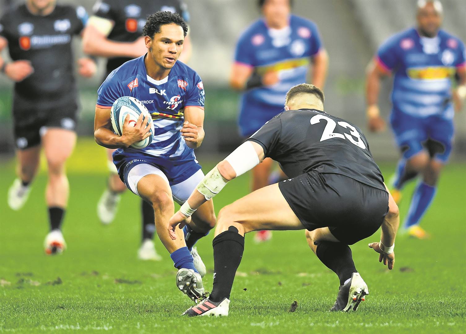 Herschel Jantjies of the Stormers and Max Nagy of Ospreys Photo: Gallo Images