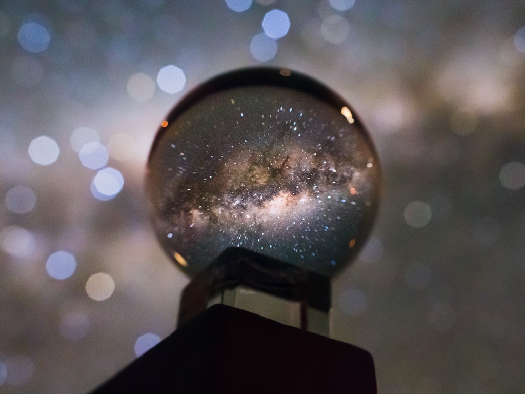 The Milky Way galaxy photographed through a crystal ball.