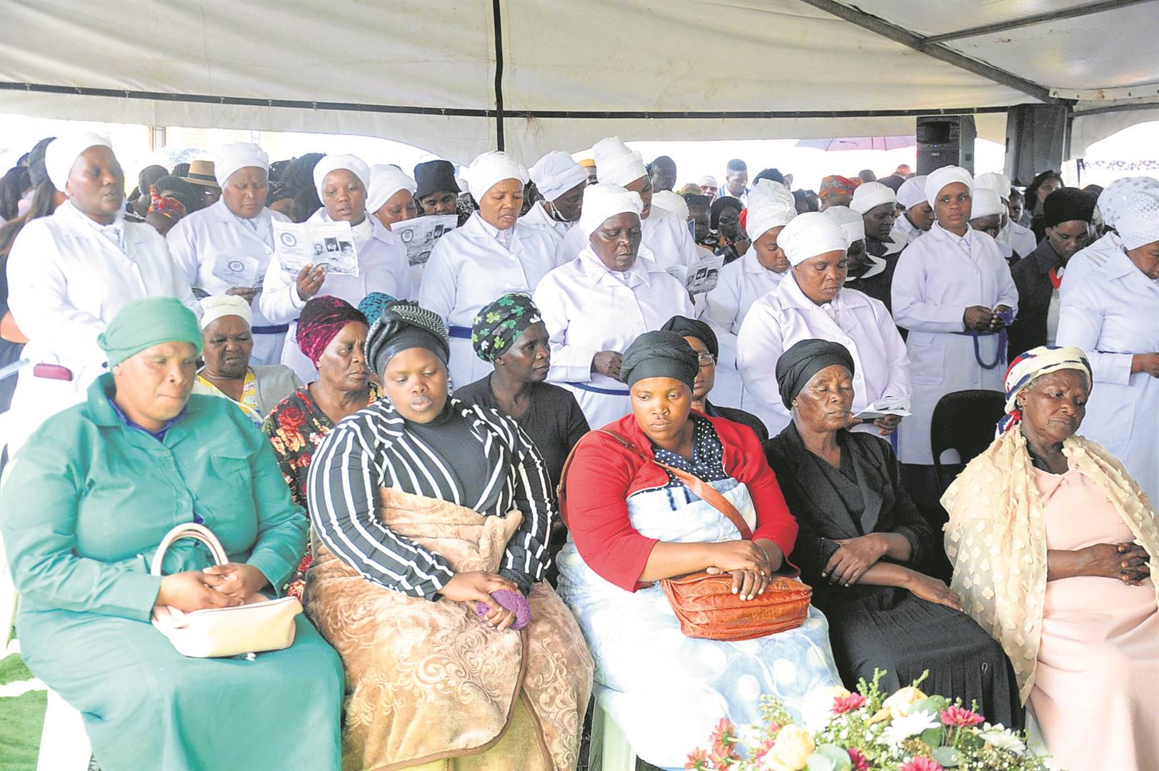 The Nhlangulela family and mourners at the funeral service of their loved ones in Verulam, north of Durban.   Photo by Jabulani Langa
